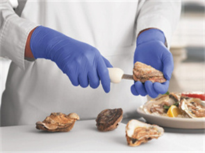Che tipo di guanti monouso sono adatti all'industria alimentare?